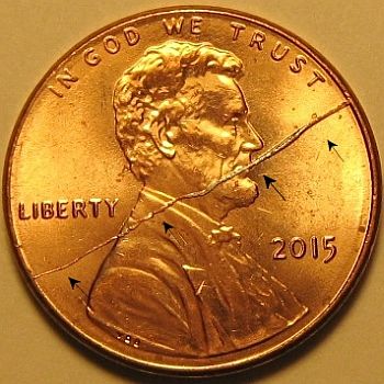 Bisecting Rim to Rim Die Cracks on U. S. Coins Cuds on Coins